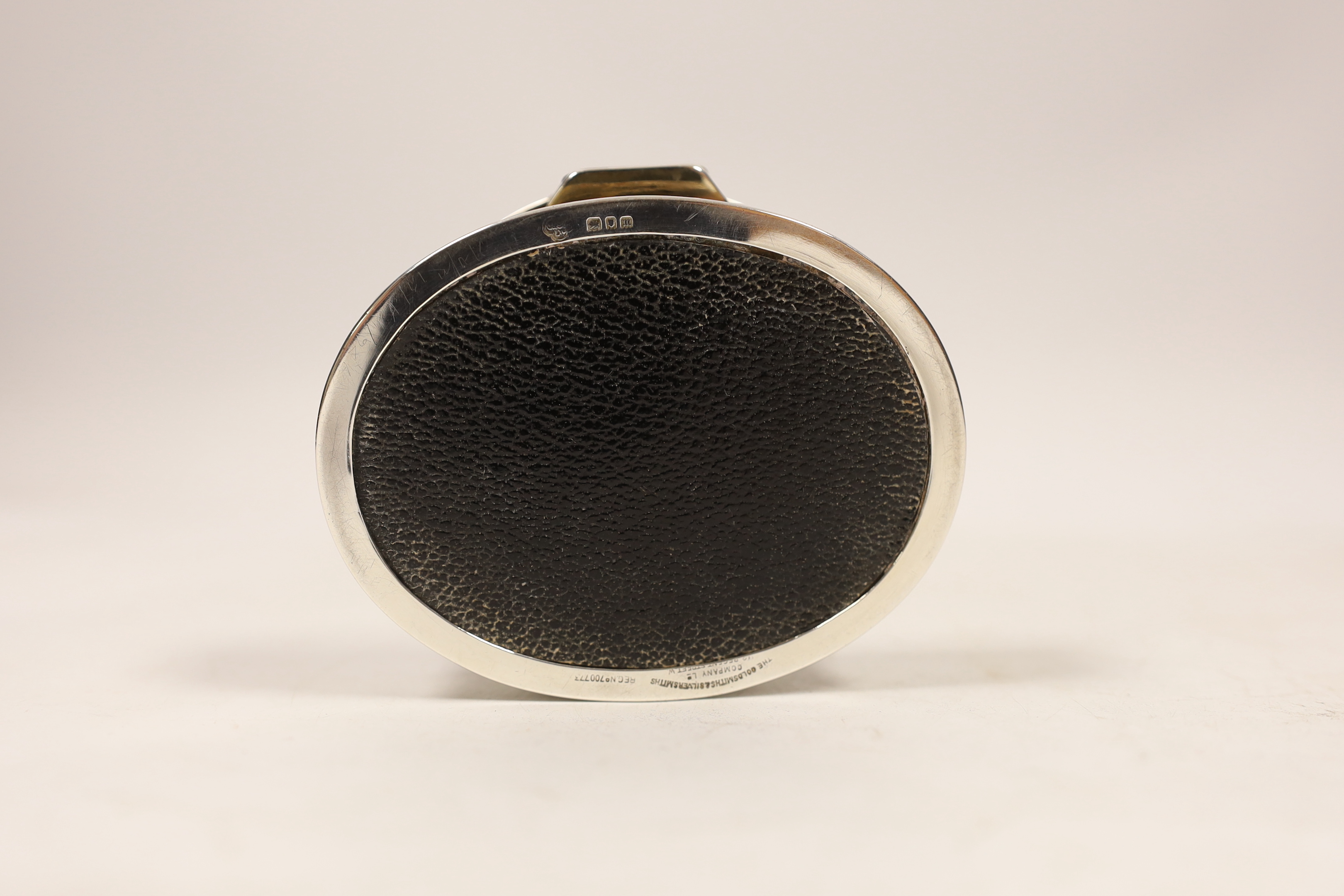 A George V silver and tortoiseshell mounted shaped oval trinket box, by Goldsmiths & Silversmiths Co Ltd, London, 1927, 98mm.